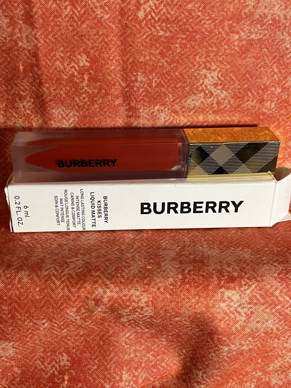 Burberry Kisses liquid matte lipstick in red/coral “Fire Red”